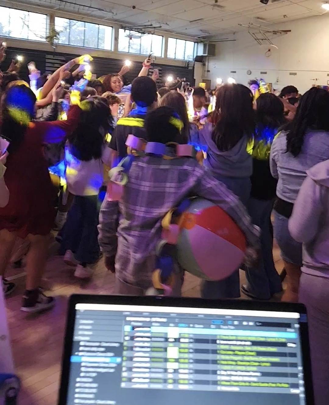 School dance event with students on the dance floor