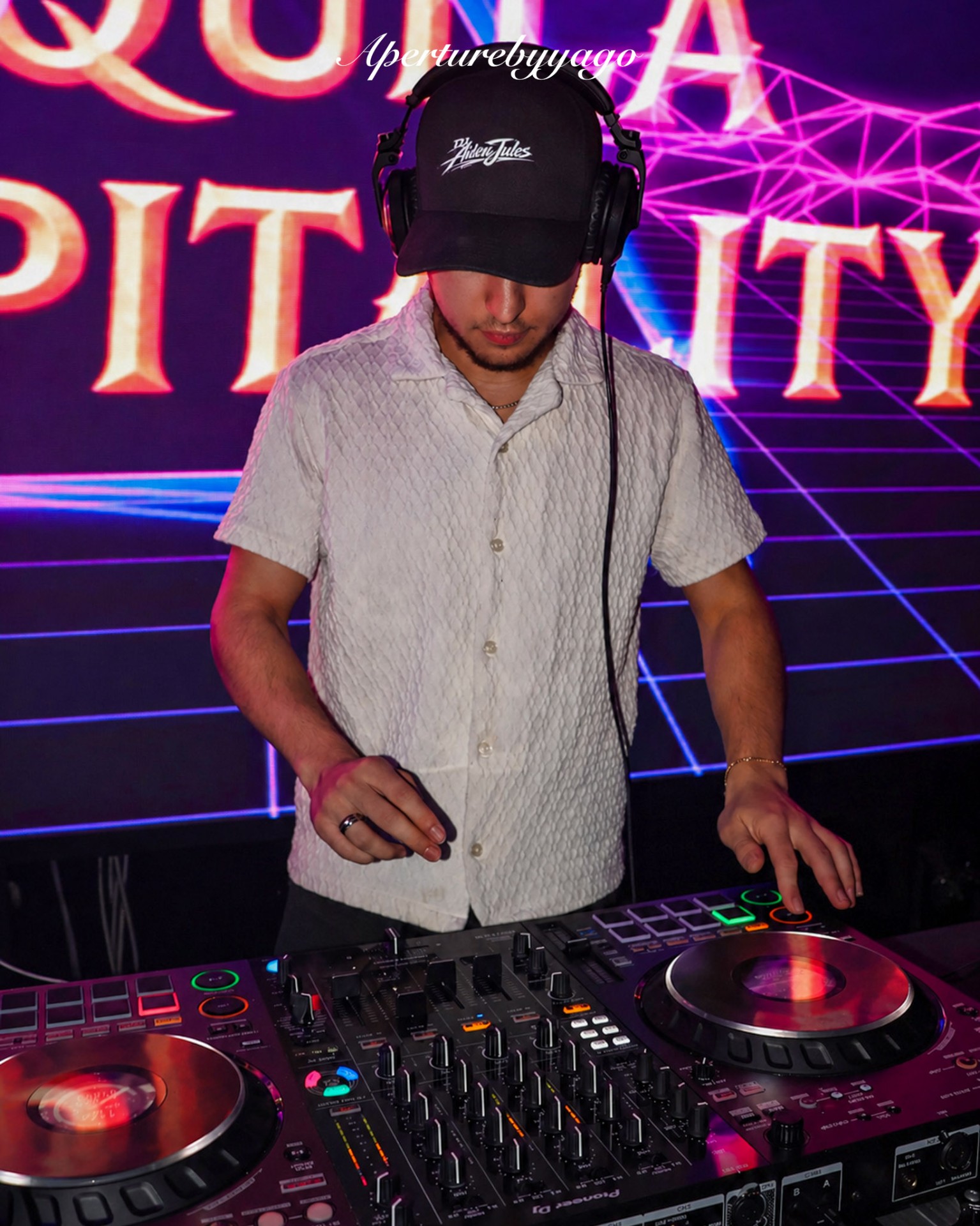 Nightlife DJ performance with laser lighting